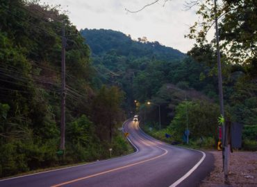 depositphotos_208863976-stock-photo-morning-road-car-rainforest-morning